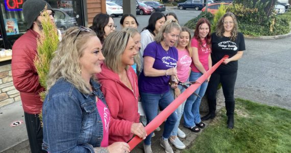 Tahvia Bridgman, owner of Vintage Baristas, celebrates the grand opening of their new location with team members on Oct. 12. Photo Courtesy of the SnoValley Chamber of Commerce.