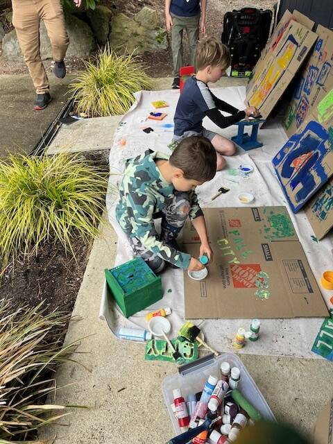 Troop 425 Scouts painting bird houses and feeders for the Fall City Art Park. Photo courtesy of Kyle Sundet