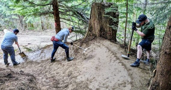 Evergreen Mountain Bike Alliance trail builders working on the soon-to-be-open Raging River trail system. Courtesy photo