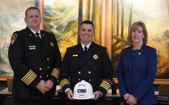 Fire Chief Mike Bailey (left), Dep. Chief Chris Brown (middle) and Snoqualmie Mayor Katherine Ross (right). (Photo courtesy of the city of Snoqualmie)