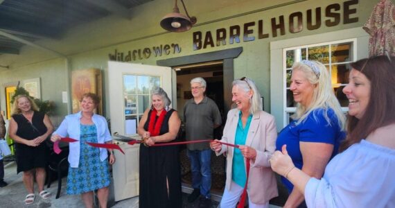 North Bend Mayor Mary Miller stopped by Wildflower Barrelhouse on July 13 to celebrate the wine bar’s ribbon cutting and grand opening. Photo courtesy of the SnoValley Chamber of Commerce