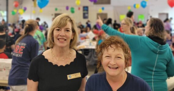 Snoqualmie Mayor Katherine Ross (left) and Snoqualmie City Councilmember Kat Cotton at the annual Firefighters Pancake Breakfast on Aug. 17. Photo courtesy of the Snoqualmie Fire Department