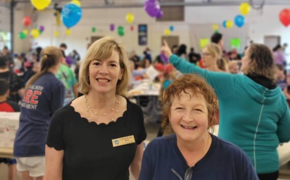 Snoqualmie Mayor Katherine Ross (left) and Snoqualmie City Councilmember Kat Cotton at the annual Firefighters Pancake Breakfast on Aug. 17. Photo courtesy of the Snoqualmie Fire Department