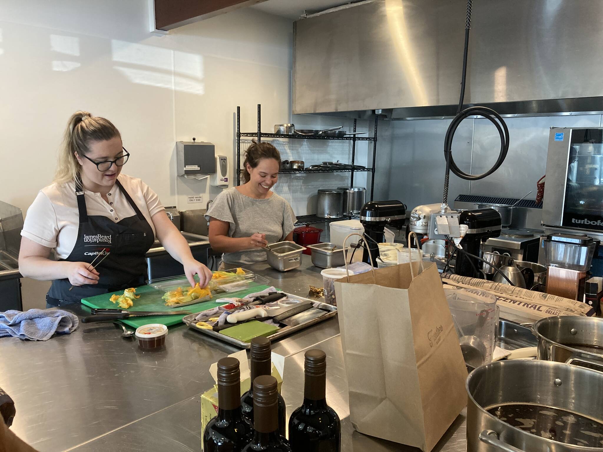 A few of the collective’s renters utilizing the commercial kitchen space. Photo by Mallory Kruml/Valley Record