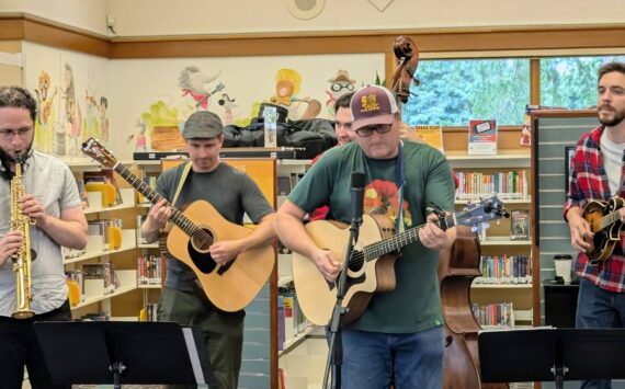 The North Bend Library celebrated its 30th anniversary on Sept. 14 from 11 a.m. to 4 p.m. with cake, cherry pie and coffee from Trail Youth Coffee. Tinkham Road, 425 Magazine’s “favorite local band,” also performed at the event. (Photo courtesy of the North Bend Library)