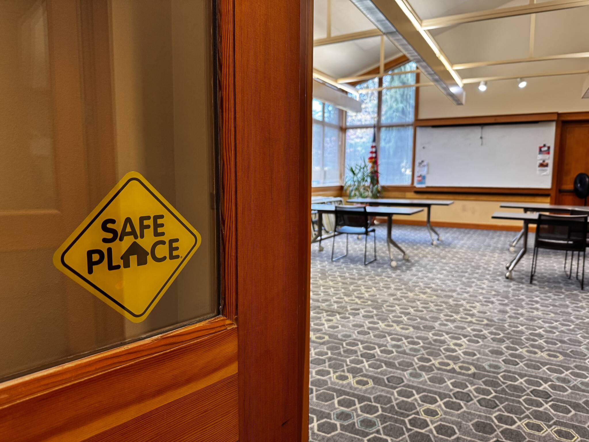 The North Bend Library has become a safe place for LGBTQ+ community members thanks to the efforts of Lambert House volunteers and library staff. (Grace Gorenflo/Valley Record)