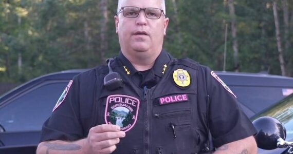 Snoqualmie Police Chief Brian Lynch with the breast cancer awareness patch. Courtesy image