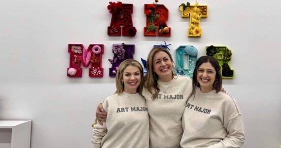 Anne Williams, owner of the Snoqualmie Art Major Studios location, stands for a photo at her grand opening Dec. 5, 2024, with Art Major Studios founder Allie Kingsley Baker (left) and owner of the Art Major Studios Colorado location McKenna Aslin (right). (Grace Gorenflo/Valley Record)