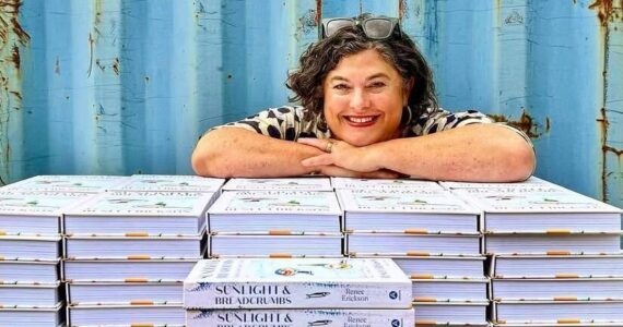 Chef Renee Erickson with copies of her new book “Sunlight and Breadcrumbs.” Photo courtesy of Eric Tra