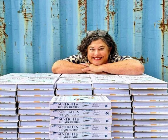 Chef Renee Erickson with copies of her new book “Sunlight and Breadcrumbs.” Photo courtesy of Eric Tra