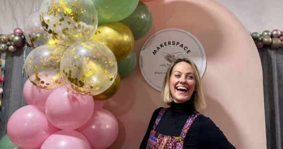 Ashley James stands for a photo at the grand opening of her new makerspace, Works from the heART, Dec. 7, 2024. (Grace Gorenflo/Valley Record)