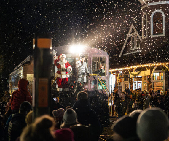 Mayor Katherine Ross arrives with Santa Claus during the Snoqualmie Winter Lights celebration on December 7, 2024, in Snoqualmie, Washington. (Photo by Henry Rodenburg)