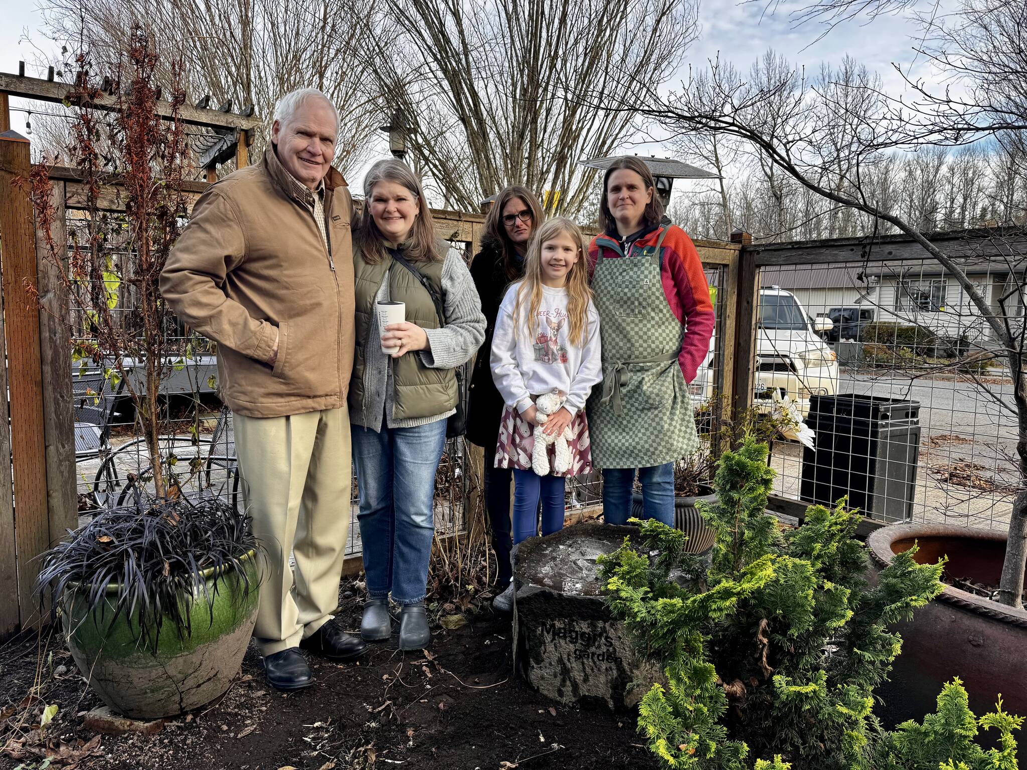 The family of Maggi Whitaker stands for a photo with Down to Earth’s new bird bath. From left: Bill Whitaker Alice Friedel, Ann Marie Whitaker, Violet Friedel and Jenny Whitaker. Photos by Grace Gorenflo/Valley Record