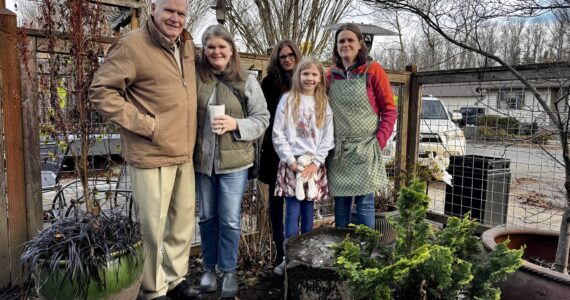 The family of Maggi Whitaker stands for a photo with Down to Earth’s new bird bath. From left: Bill Whitaker Alice Friedel, Ann Marie Whitaker, Violet Friedel and Jenny Whitaker. (Grace Gorenflo/Valley Record)