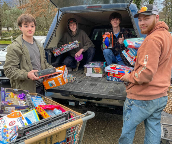 <p>Student volunteers unload gifts for the 2024 Giving Tree shop at the Church of Jesus Christ of Latter-day Saints in North Bend. Photo courtesy of Joe Dockery</p>