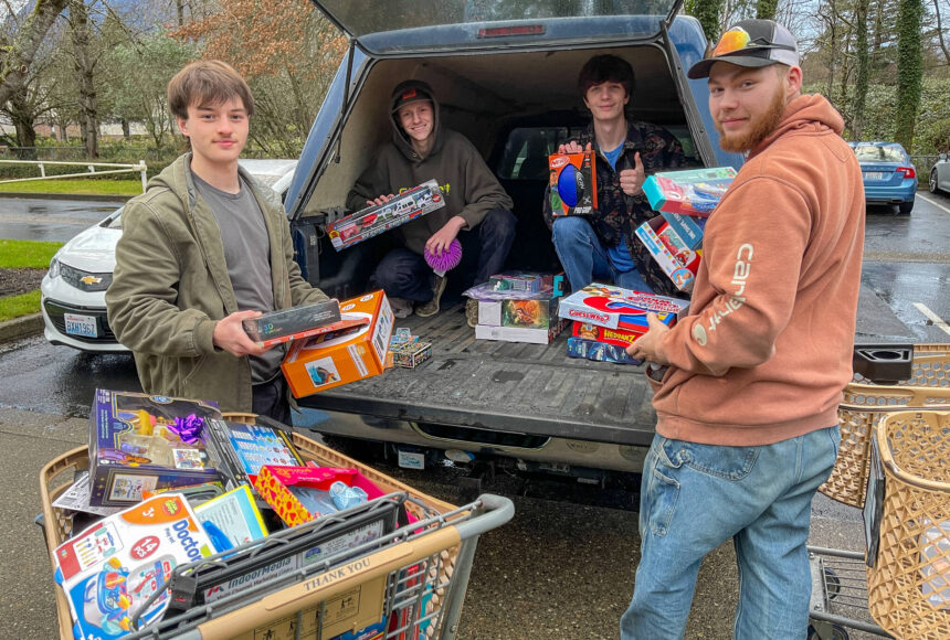 <p>Student volunteers unload gifts for the 2024 Giving Tree shop at the Church of Jesus Christ of Latter-day Saints in North Bend. Photo courtesy of Joe Dockery</p>