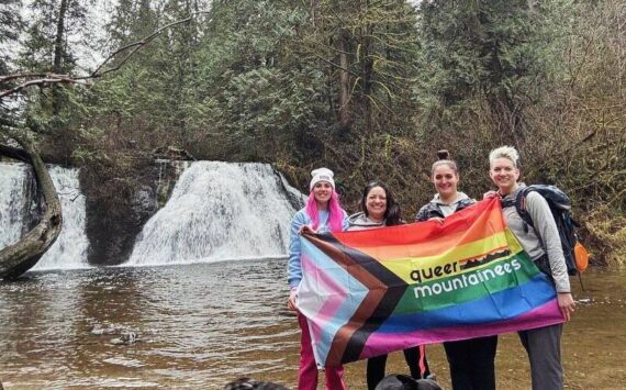 Attendees of a Queer Mountaineers hike at Cherry Creek Falls in Duvall in 2024. Photo courtesy of Queer Mountaineers