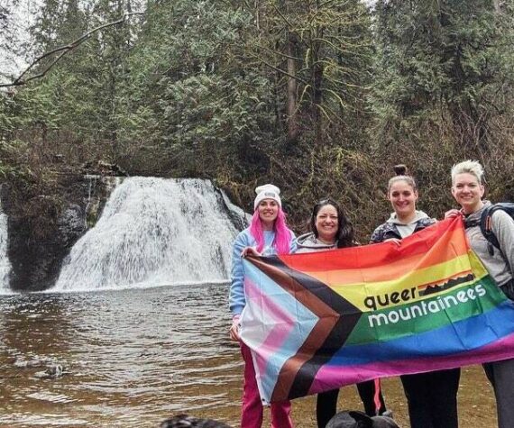 Attendees of a Queer Mountaineers hike at Cherry Creek Falls in Duvall in 2024. Photo courtesy of Queer Mountaineers