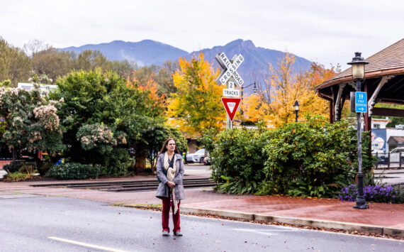 Sharilyn Lux, pictured here in downtown Snoqualmie, believes local police botched the investigation of her unsolved rape case from 2019. A 15-year protection order put against Lux by the Snoqualmie city clerk last year bars her from coming within 500 feet of City Hall. (Mike Kane /InvestigateWest)